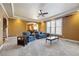 Open living room with hardwood floors and access to kitchen at 6820 Milbury Ct, Alpharetta, GA 30005