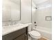 Clean bathroom with marble vanity, bathtub, and single sink at 124 Woodcrest Way, Mcdonough, GA 30253