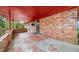 Covered brick patio with access to the home at 2425 Hillside Ave, Decatur, GA 30032