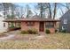 Brick ranch house with carport and mature trees at 2425 Hillside Ave, Decatur, GA 30032