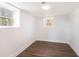 Finished basement room with hardwood floors and large windows at 2961 Delmar Nw Ln, Atlanta, GA 30311