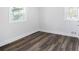 Bright bedroom with neutral walls and wood-look floors at 2961 Delmar Nw Ln, Atlanta, GA 30311