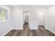 Spacious bedroom with hardwood floors and access to bathroom at 2961 Delmar Nw Ln, Atlanta, GA 30311