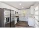 Modern kitchen with stainless steel appliances and white cabinets at 2961 Delmar Nw Ln, Atlanta, GA 30311