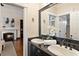 Double vanity bathroom with granite countertop at 34 Peachtree Ne Cir, Atlanta, GA 30309