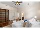 Comfortable bedroom with built-in shelves and hardwood floors at 34 Peachtree Ne Cir, Atlanta, GA 30309