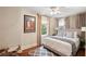 Bright bedroom with king-size bed and neutral decor at 34 Peachtree Ne Cir, Atlanta, GA 30309