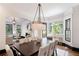 Elegant dining room with large windows and hardwood floors at 34 Peachtree Ne Cir, Atlanta, GA 30309