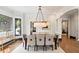 Formal dining room featuring hardwood floors and stained glass window at 34 Peachtree Ne Cir, Atlanta, GA 30309