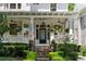 Charming front porch with stone steps and hanging plants at 34 Peachtree Ne Cir, Atlanta, GA 30309