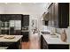 Spacious kitchen with stainless steel appliances and marble countertops at 34 Peachtree Ne Cir, Atlanta, GA 30309