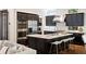 Modern kitchen with stainless steel appliances and a large island at 34 Peachtree Ne Cir, Atlanta, GA 30309