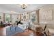Bright living room featuring hardwood floors and a cozy sitting area at 34 Peachtree Ne Cir, Atlanta, GA 30309