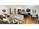 Open concept living area with hardwood floors and a neutral color palette at 34 Peachtree Ne Cir, Atlanta, GA 30309