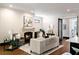 Cozy living room features a fireplace and plenty of natural light at 34 Peachtree Ne Cir, Atlanta, GA 30309