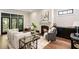 Spacious living area with hardwood floors and access to a backyard at 34 Peachtree Ne Cir, Atlanta, GA 30309
