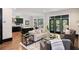 Open living space with hardwood floors and a view of the kitchen at 34 Peachtree Ne Cir, Atlanta, GA 30309
