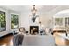 Spacious living room featuring a fireplace and hardwood floors at 34 Peachtree Ne Cir, Atlanta, GA 30309