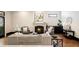 Living room with fireplace, hardwood floors, and french doors at 34 Peachtree Ne Cir, Atlanta, GA 30309