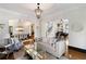 Open living room with adjacent dining area and hardwood floors at 34 Peachtree Ne Cir, Atlanta, GA 30309