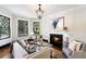 Spacious living room with hardwood floors and fireplace at 34 Peachtree Ne Cir, Atlanta, GA 30309