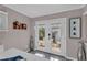 White table and built in bench with view to backyard at 727 Charlotte Nw Pl, Atlanta, GA 30318