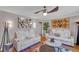 Spacious living area with hardwood floors and stylish decor at 727 Charlotte Nw Pl, Atlanta, GA 30318