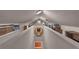 Open loft area with two separate seating areas at 727 Charlotte Nw Pl, Atlanta, GA 30318
