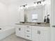 Double vanity bathroom with granite countertop at 1904 Glen Ivy # 19, Marietta, GA 30062