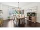 Bright dining room with hardwood floors and a charming chandelier at 1904 Glen Ivy # 19, Marietta, GA 30062