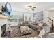 Living room with fireplace, sectional sofa, and TV at 1904 Glen Ivy # 19, Marietta, GA 30062