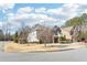 Two story house on corner lot with landscaping at 2090 Red Barn Ct, Cumming, GA 30040