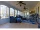 Relaxing screened porch with tiled floor and comfortable seating at 2875 Clary Hill Ne Dr, Roswell, GA 30075