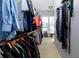 Large walk-in closet with ample shelving and hanging space at 2875 Clary Hill Ne Dr, Roswell, GA 30075