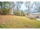 Large backyard with a view of neighboring homes and trees at 3738 Larkspur Ter, Decatur, GA 30032