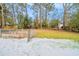 Large backyard with fenced area and light dusting of snow at 3738 Larkspur Ter, Decatur, GA 30032