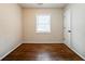 Bedroom with hardwood floors, window and closet at 3738 Larkspur Ter, Decatur, GA 30032
