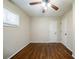 Spacious bedroom with hardwood floors and ceiling fan at 3738 Larkspur Ter, Decatur, GA 30032