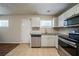 Updated kitchen with granite countertops and stainless steel appliances at 3738 Larkspur Ter, Decatur, GA 30032