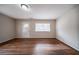 Living room with hardwood floors and a large window at 3738 Larkspur Ter, Decatur, GA 30032