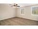Spacious bedroom with ceiling fan and carpet at 4071 Williamsburg Dr, Atlanta, GA 30337