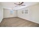 Spacious bedroom with ceiling fan and plush carpeting at 4071 Williamsburg Dr, Atlanta, GA 30337
