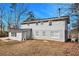 Gray house with large backyard at 4071 Williamsburg Dr, Atlanta, GA 30337