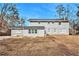 Gray house with large backyard at 4071 Williamsburg Dr, Atlanta, GA 30337