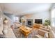 Bright living room featuring a fireplace and hardwood floors at 1550 Park Creek Ne Ln, Brookhaven, GA 30319