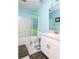 Clean bathroom with a white vanity and blue walls at 627 Honey Creek Rd, Mcdonough, GA 30252