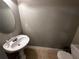 Simple bathroom with pedestal sink and tile floor at 990 Harbins Rd # 5D, Norcross, GA 30093