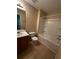 Clean bathroom with tub shower combo, toilet and vanity at 990 Harbins Rd # 5D, Norcross, GA 30093