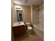 Clean bathroom with tub shower combo, toilet and vanity at 990 Harbins Rd # 5D, Norcross, GA 30093