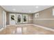 Spacious unfinished basement with neutral paint and tile flooring at 1048 Standard Ne Dr, Atlanta, GA 30319